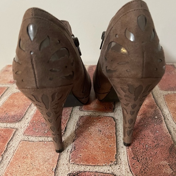 Ankle Boots Size 7 with 4" platform heels and design cutouts on heels. - Picture 4 of 5